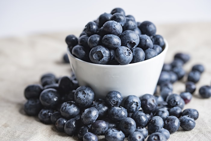 Mixed seasonal berry box with strawberries, blueberries and raspberries