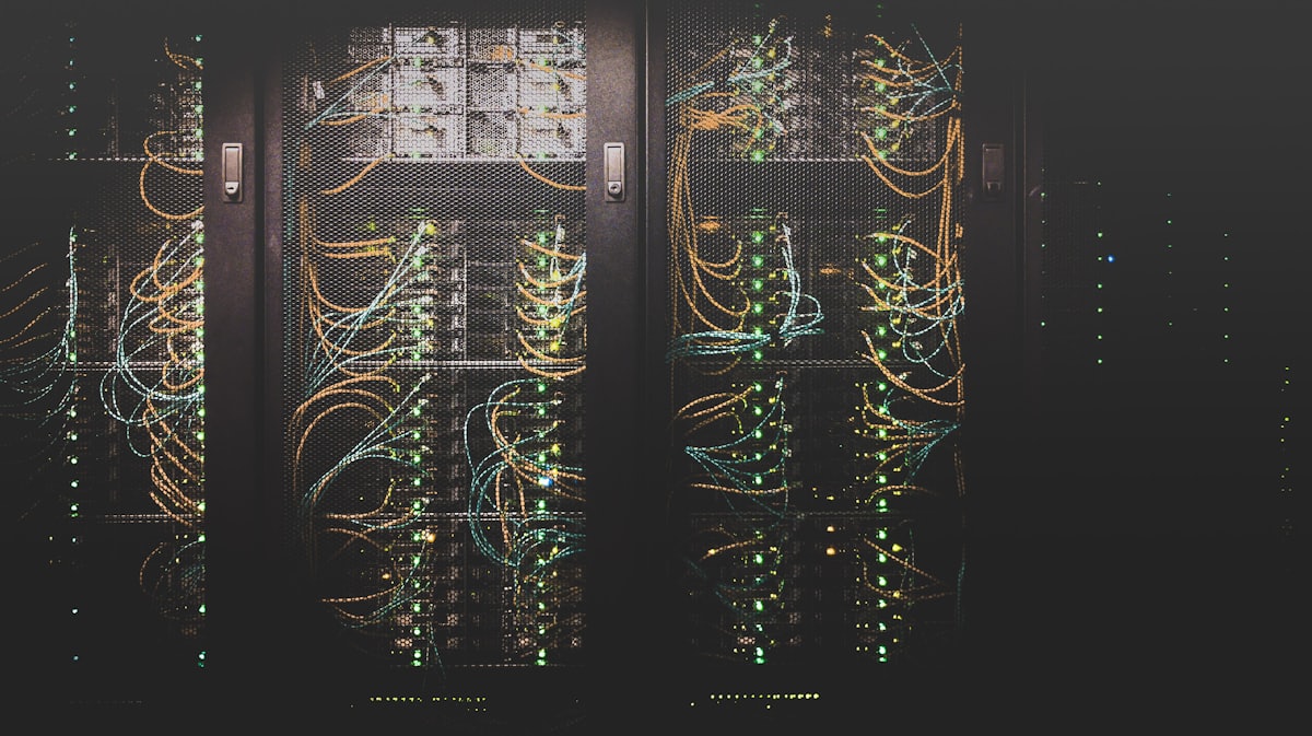Server room showing rows of rack-mounted infrastructure — the kind Northport Technologies monitors and manages around the clock