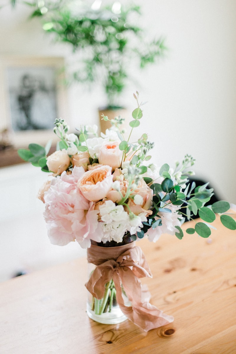 First Apology bouquet — lilac roses, white anemones, and soft lavender sprigs