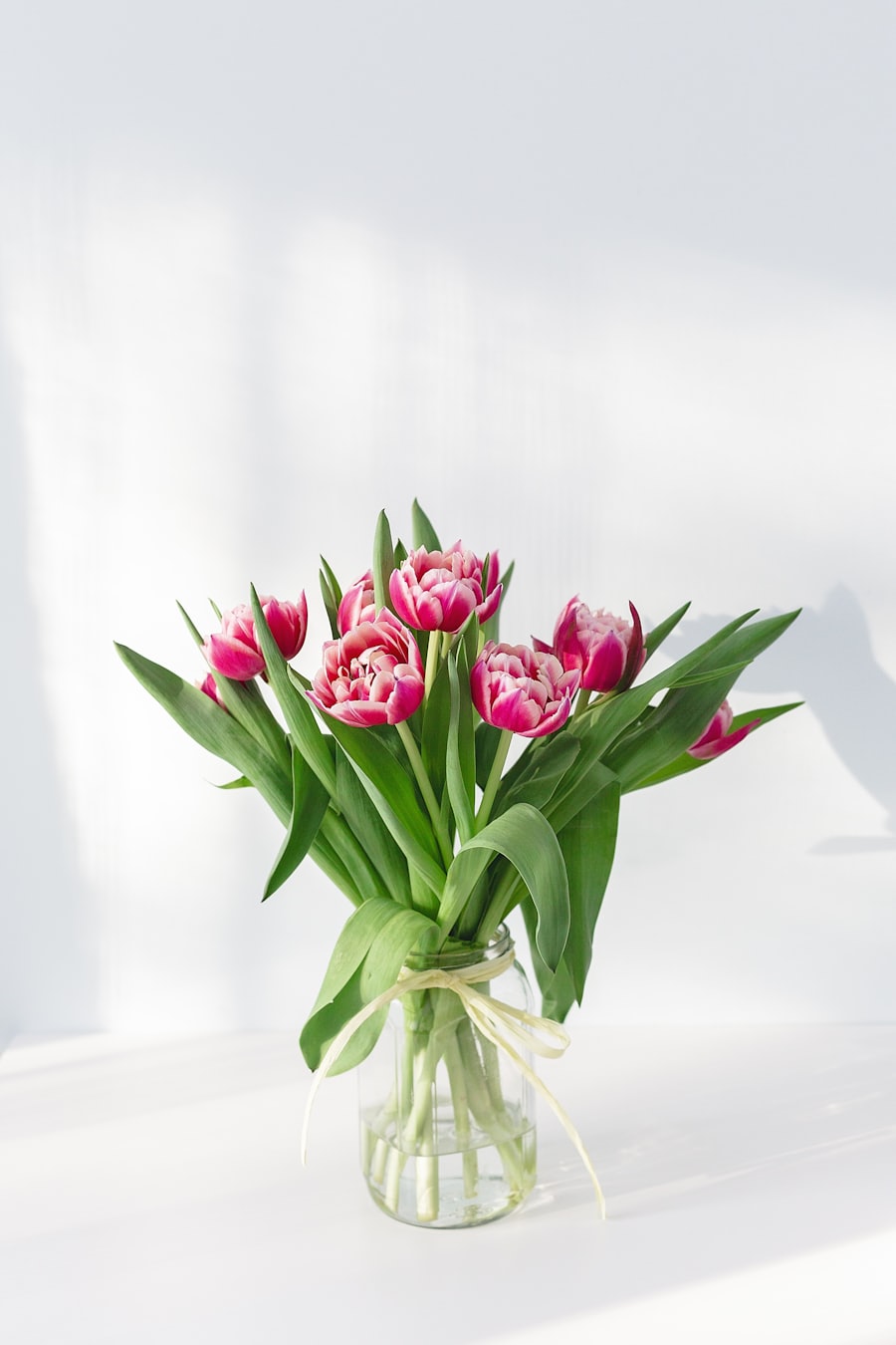 Wildstem florist hand-tying a seasonal bouquet in the studio